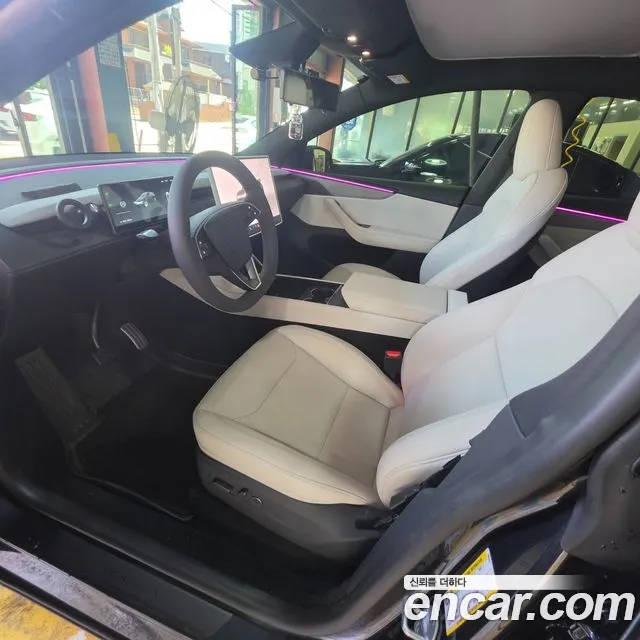 Tesla Model Y — Фото автомобиля 5