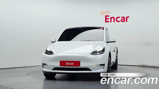 Tesla Model Y — Фото автомобиля 3
