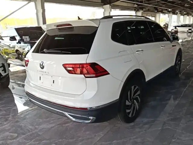 Volkswagen Tiguan L — Фото автомобиля 6