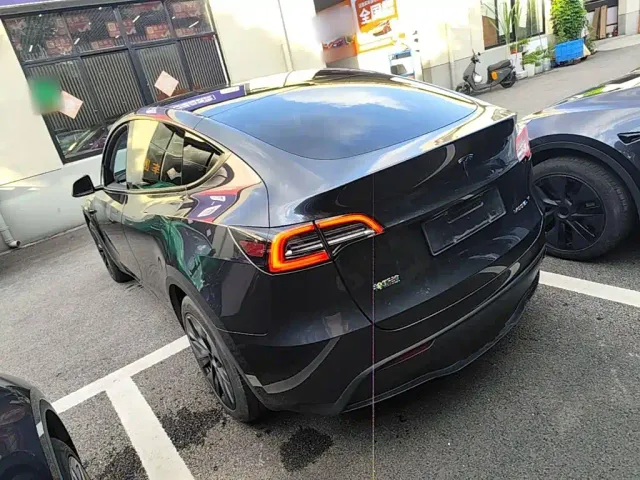 Tesla Model Y — Фото автомобиля 4