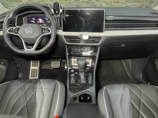 Volkswagen Tiguan L — Фото автомобиля 16