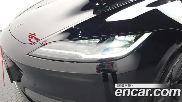 Tesla Model 3 — Фото автомобиля 7