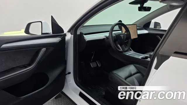 Tesla Model Y — Фото автомобиля 10