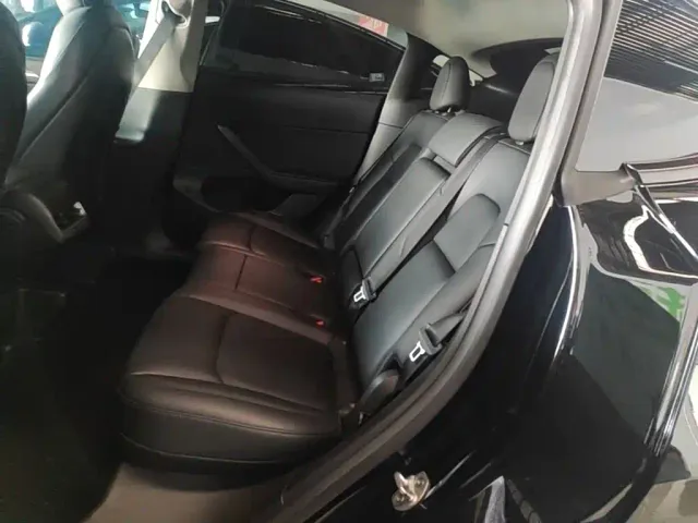Tesla Model Y — Фото автомобиля 16