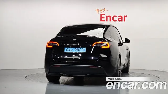 Tesla Model Y — Фото автомобиля 4