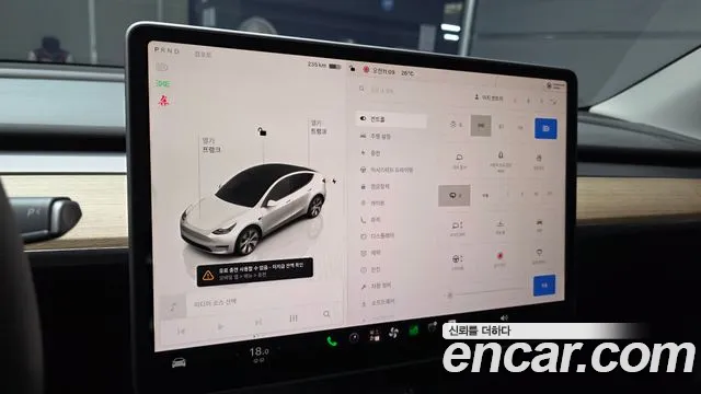 Tesla Model Y — Фото автомобиля 15