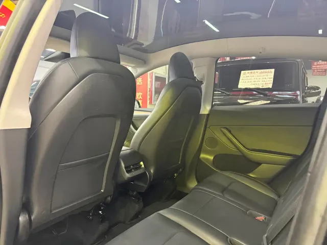 Tesla Model Y — Фото автомобиля 5