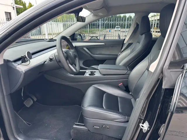 Tesla Model Y — Фото автомобиля 7