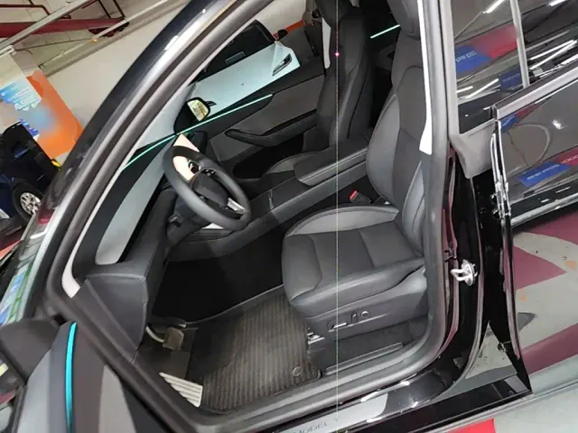 Tesla Model Y — Фото автомобиля 14