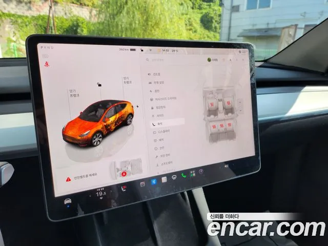 Tesla Model Y — Фото автомобиля 14