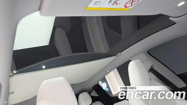 Tesla Model Y — Фото автомобиля 17