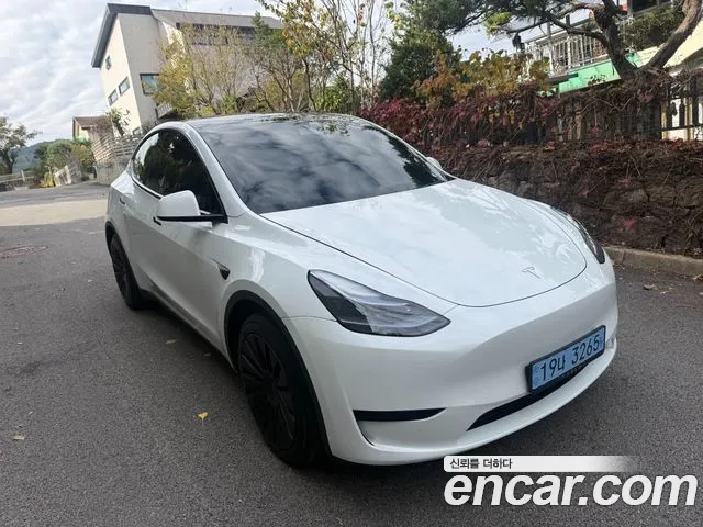 Tesla Model Y — Фото автомобиля 3