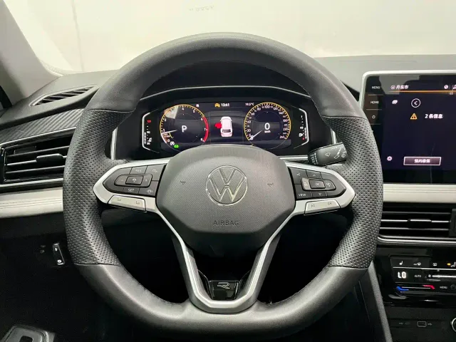 Volkswagen Tiguan L — Фото автомобиля 12