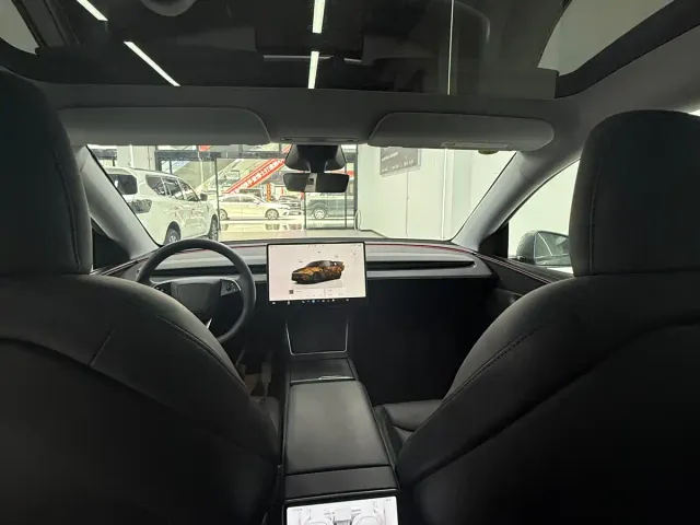 Tesla Model Y — Фото автомобиля 8