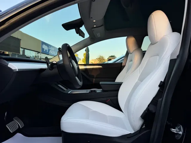 Tesla Model Y — Фото автомобиля 26
