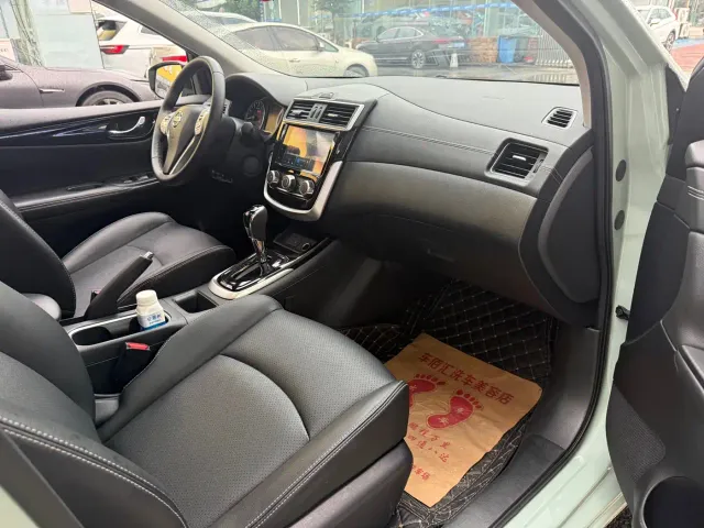 Nissan Tiida — Фото автомобиля 7