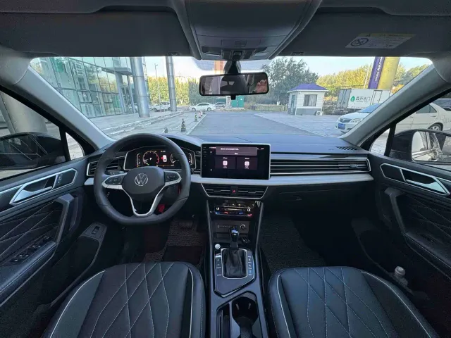 Volkswagen Tiguan L — Фото автомобиля 8