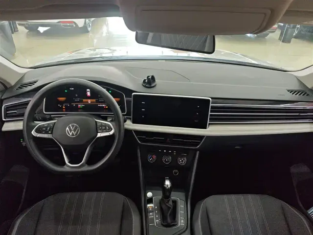 Volkswagen Tiguan L — Фото автомобиля 9