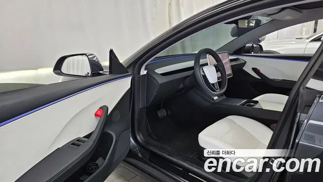 Tesla Model 3 — Фото автомобиля 15
