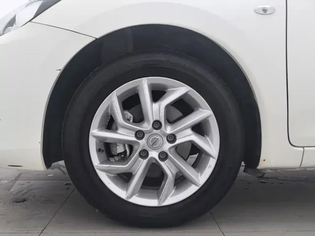Nissan Tiida — Фото автомобиля 17