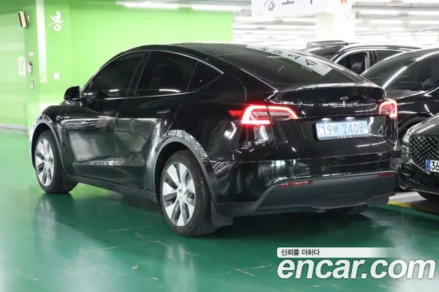 Tesla Model Y — Фото автомобиля 5