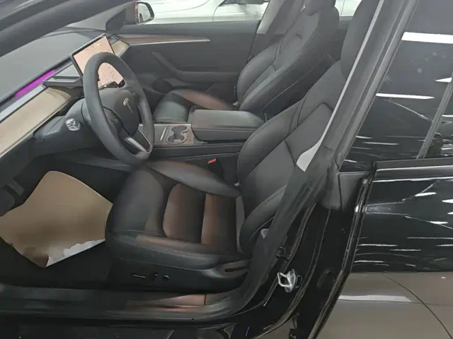 Tesla Model 3 — Фото автомобиля 14