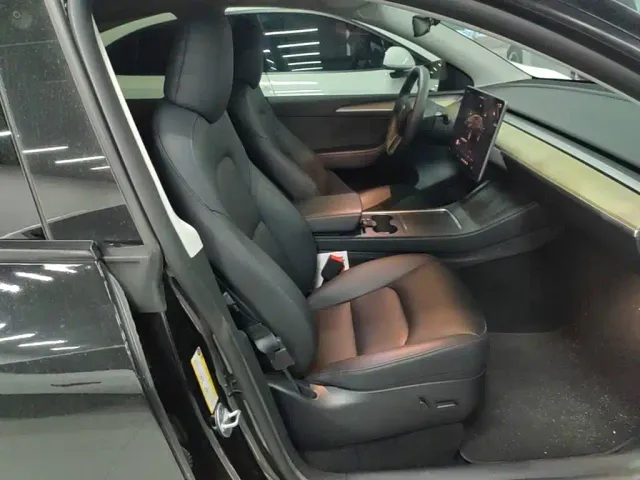 Tesla Model Y — Фото автомобиля 24