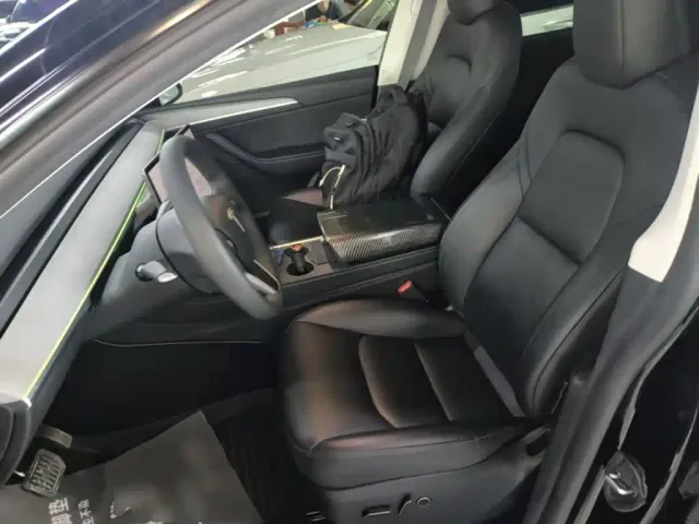 Tesla Model Y — Фото автомобиля 14