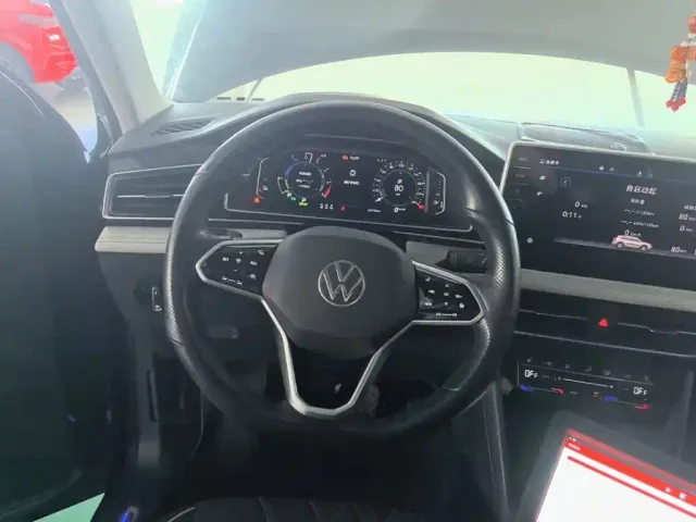 Volkswagen Tiguan L PHEV — Фото автомобиля 10