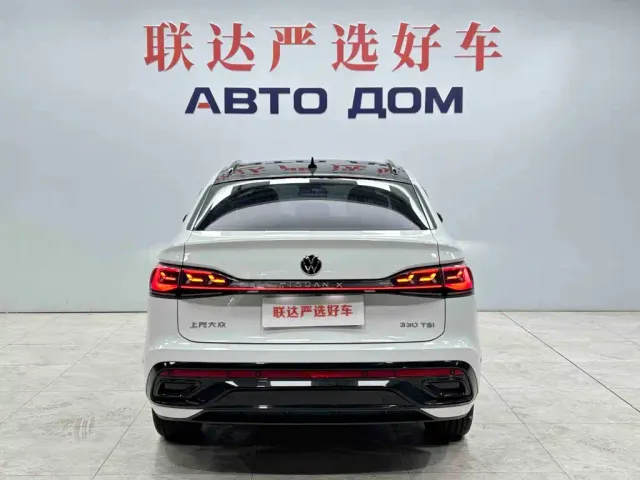 Volkswagen Tiguan X — Фото автомобиля 5