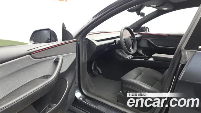 Tesla Model Y — Фото автомобиля 10