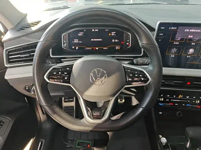 Volkswagen Tiguan L — Фото автомобиля 10