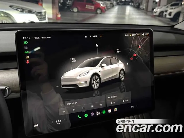 Tesla Model Y — Фото автомобиля 14