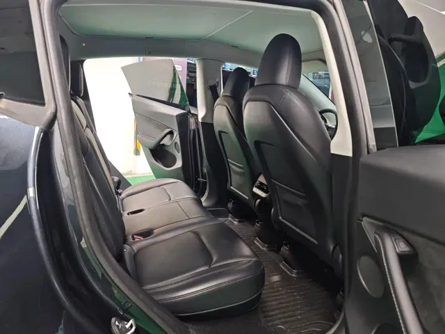 Tesla Model Y — Фото автомобиля 7