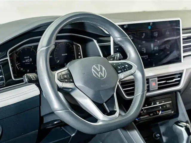 Volkswagen Tiguan L — Фото автомобиля 10