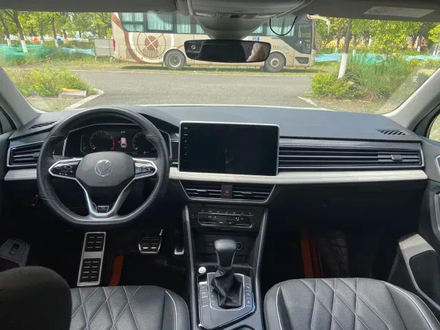 Volkswagen Tiguan L — Фото автомобиля 7
