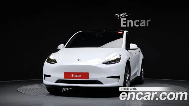 Tesla Model Y — Фото автомобиля 3
