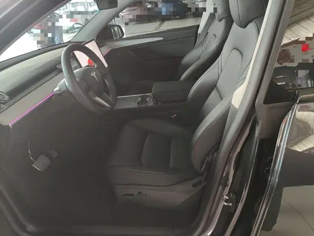 Tesla Model Y — Фото автомобиля 14