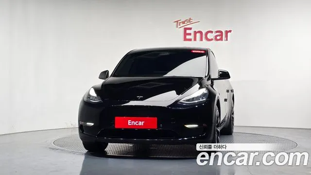 Tesla Model Y — Фото автомобиля 3