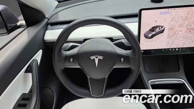 Tesla Model Y — Фото автомобиля 19