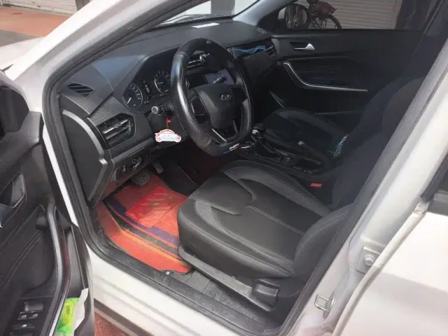 Chery Tiggo 3x — Фото автомобиля 13