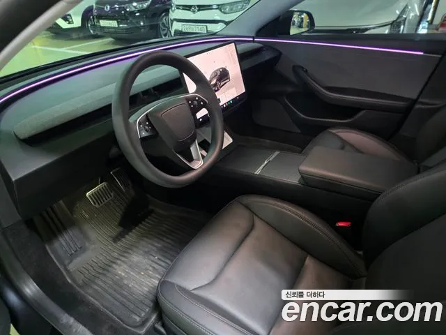 Tesla Model 3 — Фото автомобиля 10