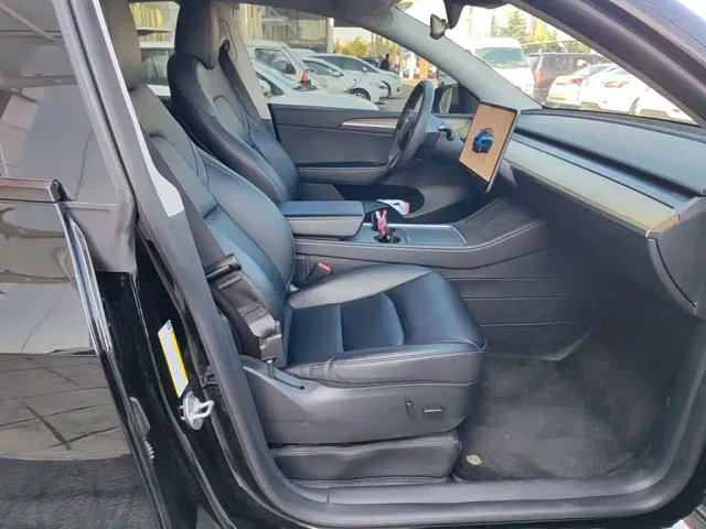 Tesla Model Y — Фото автомобиля 24