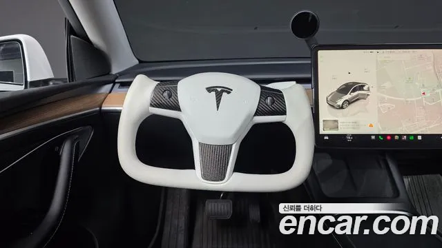 Tesla Model Y — Фото автомобиля 19
