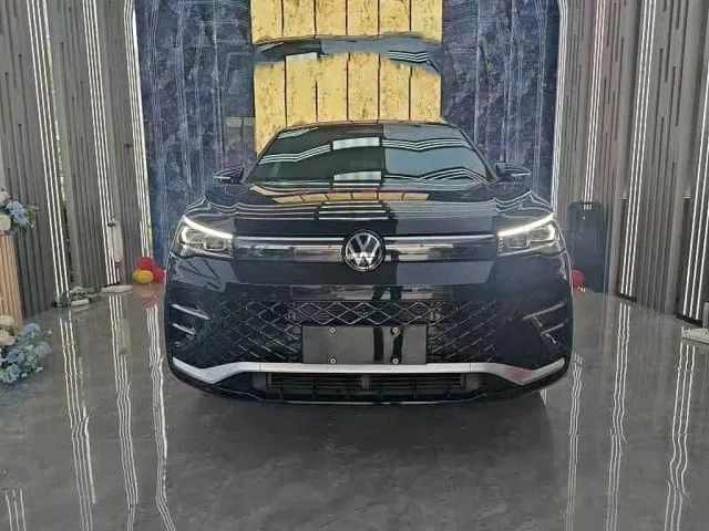 Volkswagen Tiguan L — Фото автомобиля 2