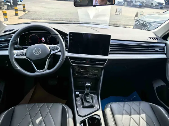Volkswagen Tiguan L — Фото автомобиля 5