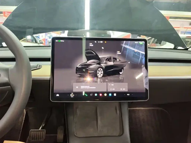 Tesla Model Y — Фото автомобиля 12