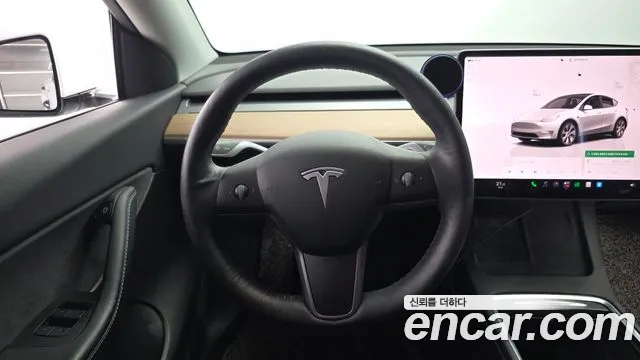 Tesla Model Y — Фото автомобиля 13