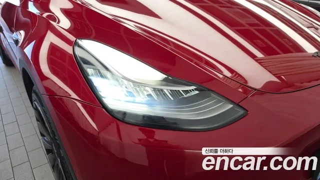 Tesla Model Y — Фото автомобиля 7