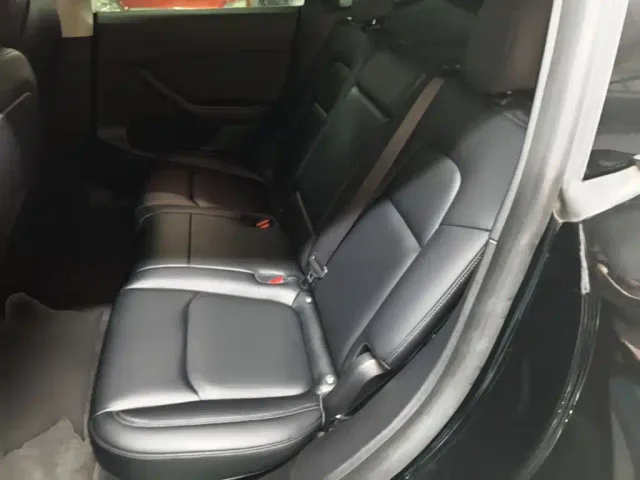 Tesla Model Y — Фото автомобиля 16